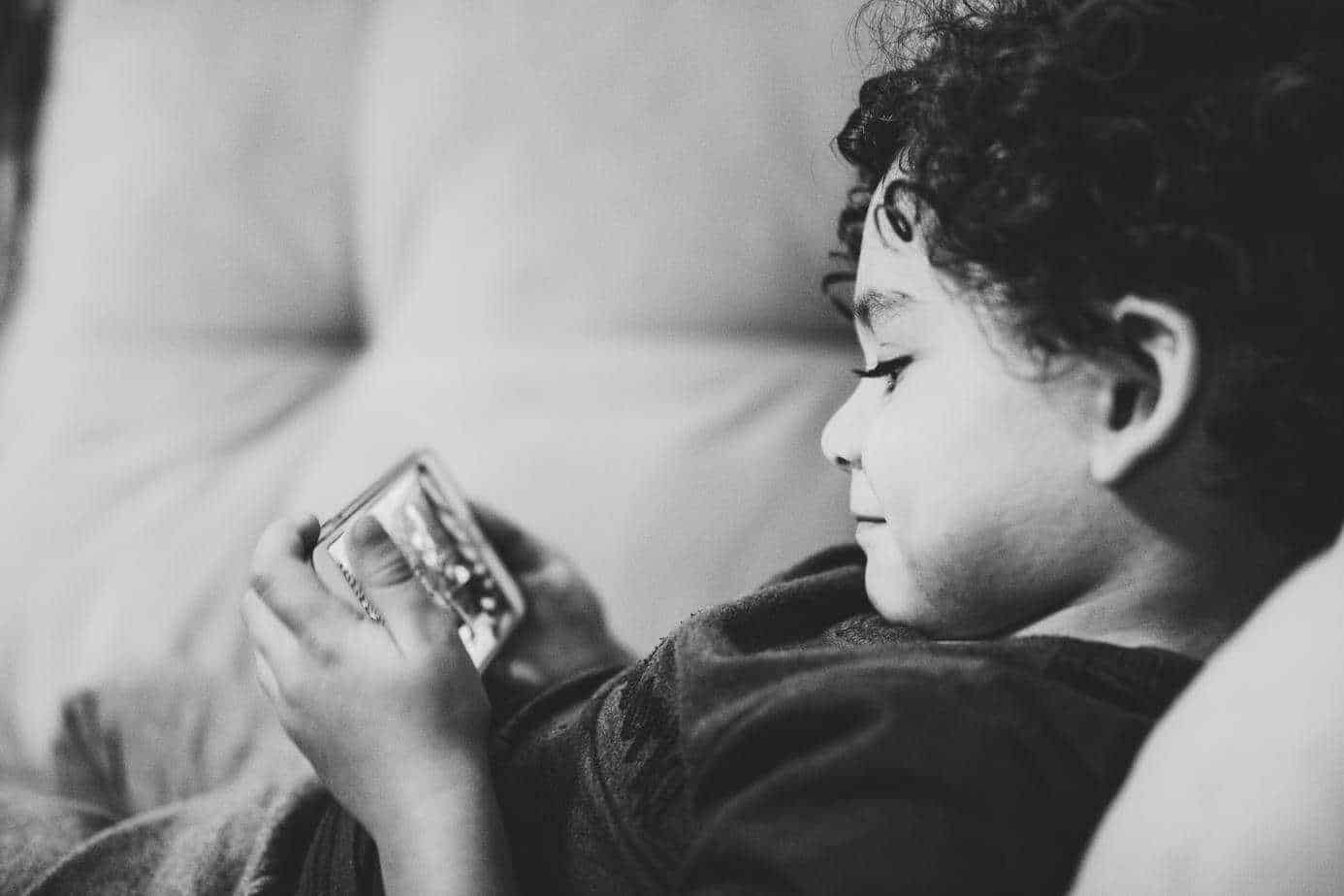 Young boy on mobile phone